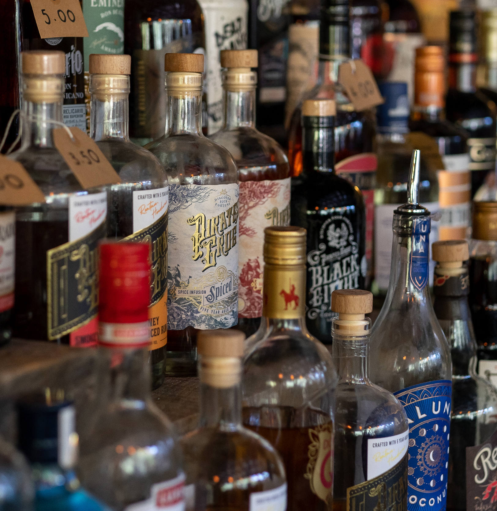 Photo showing bottles of spirits at Rum Bar